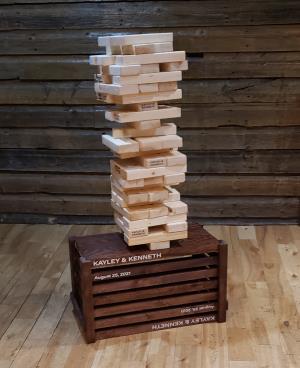 Giant Tumbling Tower (Jenga) with stained crate